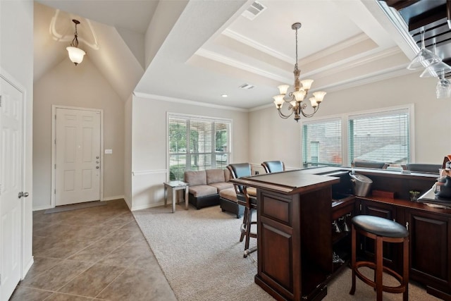722 Tom Kite Dr, Round Rock, TX 78664 - dining area featuring tile patterned floors, a chandelier, and ornamental molding