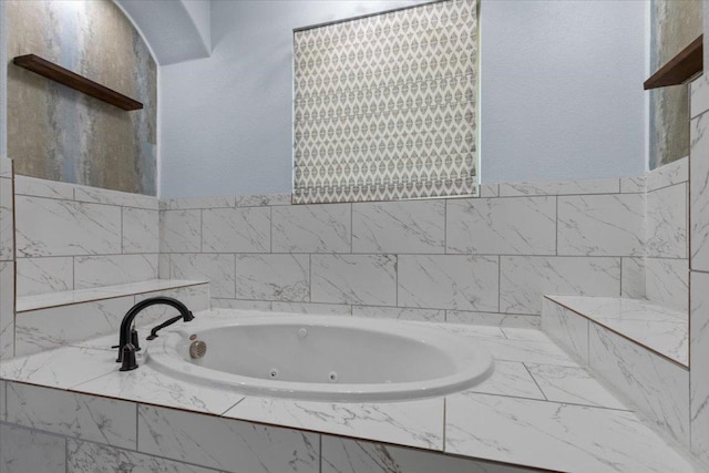 127 Medlar Dr, Cedar Creek, TX 78612 - bathroom with a jetted tub