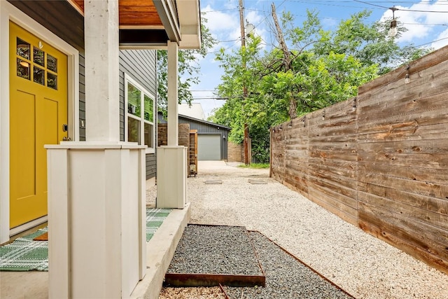 5512 Duval St Unit 2, Austin, TX 78751 - view of side of property with an outdoor structure and a garage
