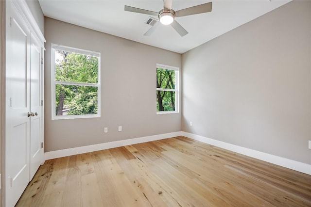 5512 Duval St Unit 2, Austin, TX 78751 - unfurnished room with baseboards, light wood-type flooring, and a ceiling fan
