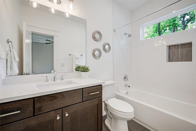 5512 Duval St Unit 2, Austin, TX 78751 - bathroom featuring vanity, tub / shower combination, and toilet