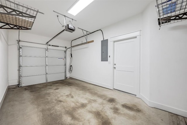 5512 Duval St Unit 2, Austin, TX 78751 - garage featuring electric panel, a garage door opener, and baseboards