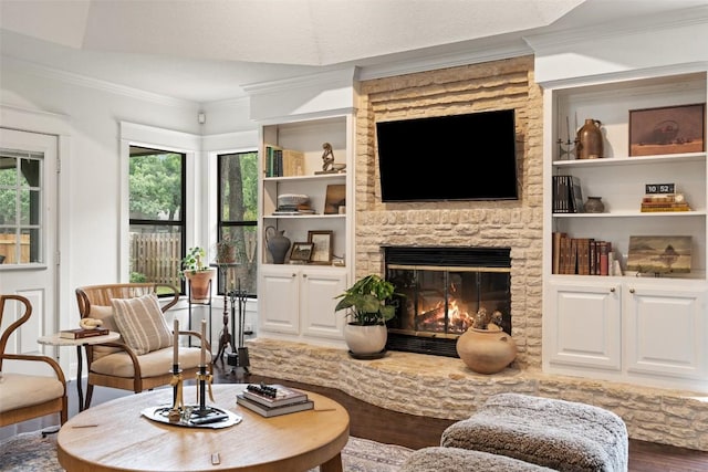 3701 Indian Point Dr, Austin, TX 78739 - living room featuring wood finished floors, a fireplace, and crown molding