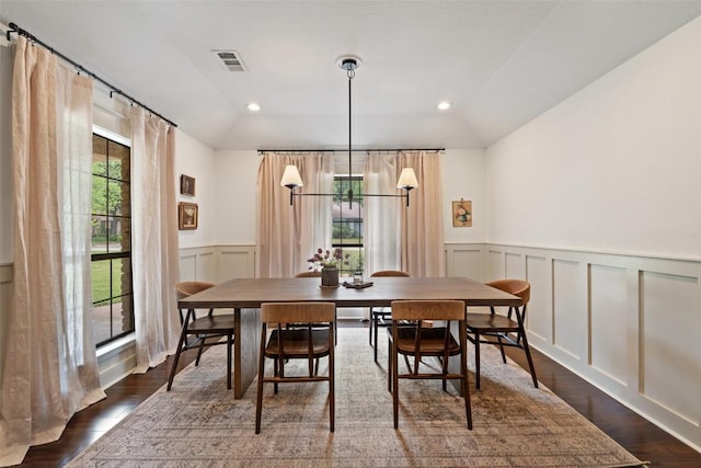 3701 Indian Point Dr, Austin, TX 78739 - dining space with a decorative wall, wainscoting, lofted ceiling, dark wood-style flooring, and recessed lighting