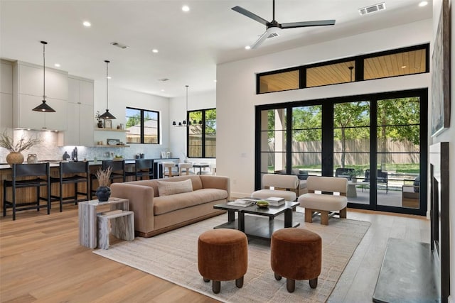 5218 Valley Oak Dr, Austin, TX 78731 - living area featuring recessed lighting, light wood-style floors, and a ceiling fan