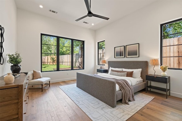5218 Valley Oak Dr, Austin, TX 78731 - bedroom featuring light wood finished floors, recessed lighting, and ceiling fan