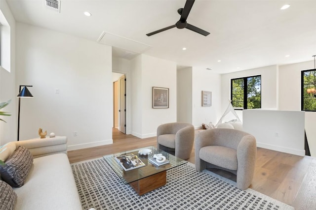 5218 Valley Oak Dr, Austin, TX 78731 - living room featuring attic access, ceiling fan, light wood-style floors, and recessed lighting