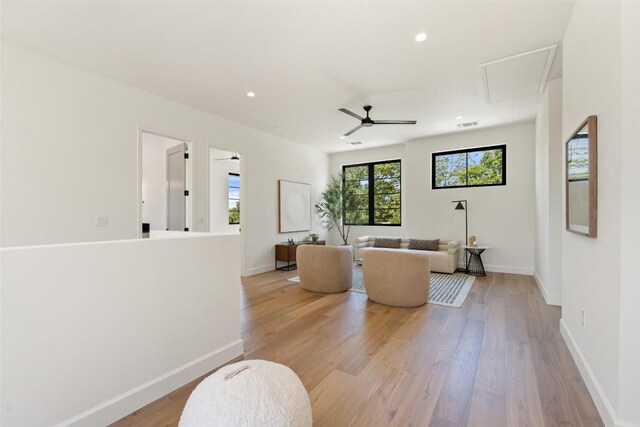 5218 Valley Oak Dr, Austin, TX 78731 - living area featuring attic access, light wood finished floors, ceiling fan, and recessed lighting