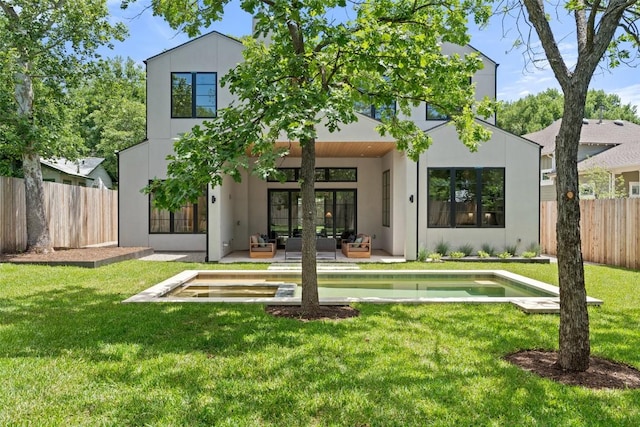 5218 Valley Oak Dr, Austin, TX 78731 - rear view of house featuring french doors, stucco siding, and an outdoor living space