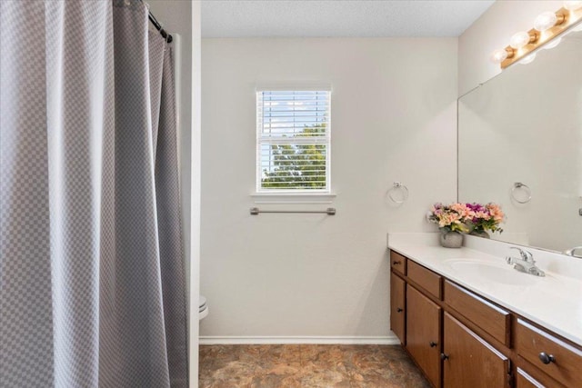 601 Wagon Wheel Trl, Pflugerville, TX 78660 - bathroom featuring vanity and a shower with shower curtain