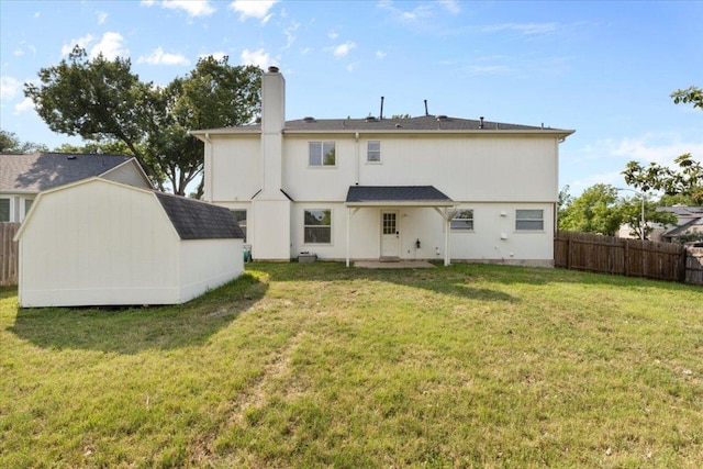 601 Wagon Wheel Trl, Pflugerville, TX 78660 - rear view of property with a storage shed and a chimney
