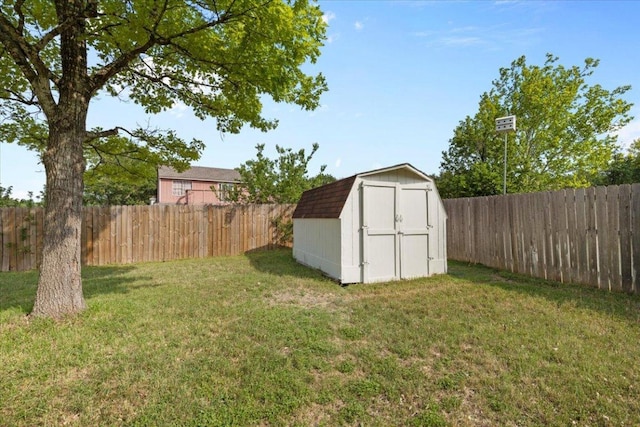 601 Wagon Wheel Trl, Pflugerville, TX 78660 - fenced backyard with a storage unit