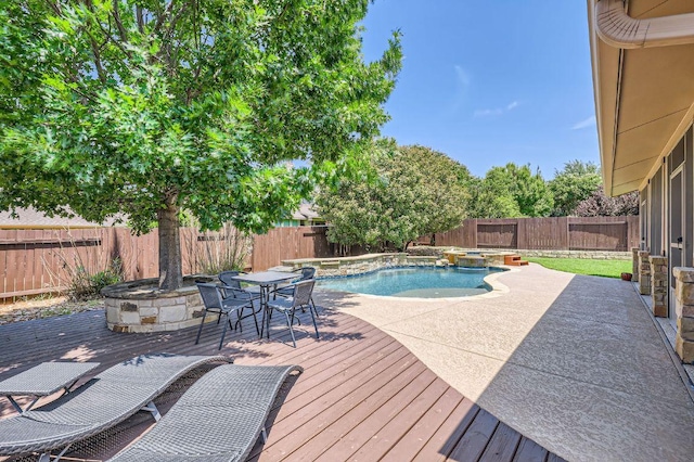 4349 Green Tree Dr, Round Rock, TX 78665 - view of pool featuring a wooden deck, a fenced backyard, outdoor dining space, and a pool with connected hot tub