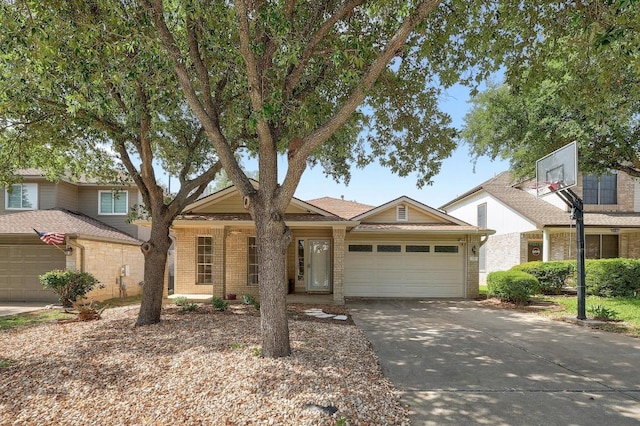 700 Horizon Trl, Cedar Park, TX 78613 - view of front of house featuring an attached garage, concrete driveway, and brick siding
