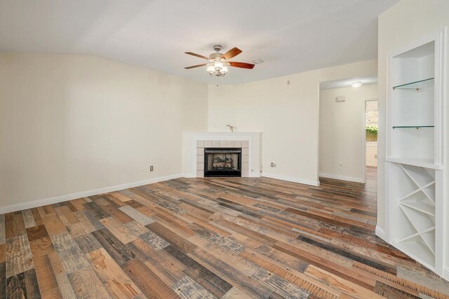 700 Horizon Trl, Cedar Park, TX 78613 - unfurnished living room featuring a ceiling fan, wood finished floors, and a fireplace