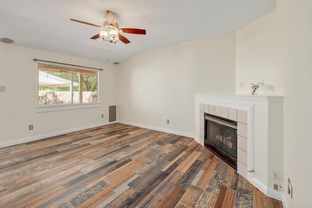 700 Horizon Trl, Cedar Park, TX 78613 - unfurnished living room featuring wood finished floors, ceiling fan, and a fireplace