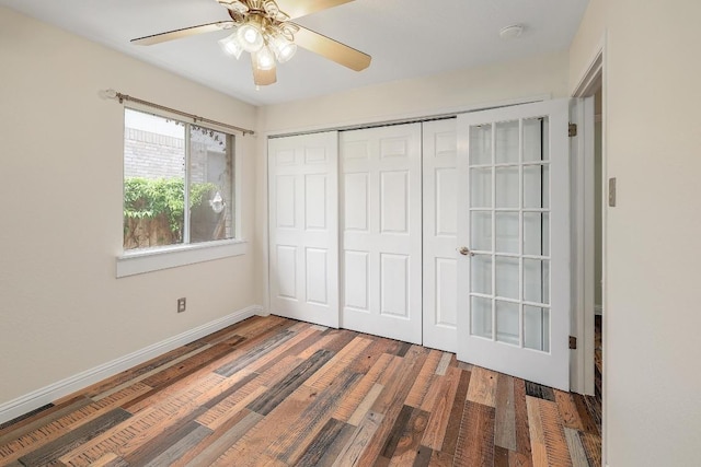 700 Horizon Trl, Cedar Park, TX 78613 - unfurnished bedroom with wood finished floors, a closet, and a ceiling fan