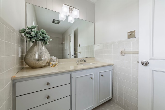 928 Porpoise St, Lakeway, TX 78734 - bathroom with tile walls and vanity