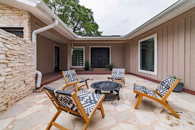 928 Porpoise St, Lakeway, TX 78734 - view of patio with a fire pit