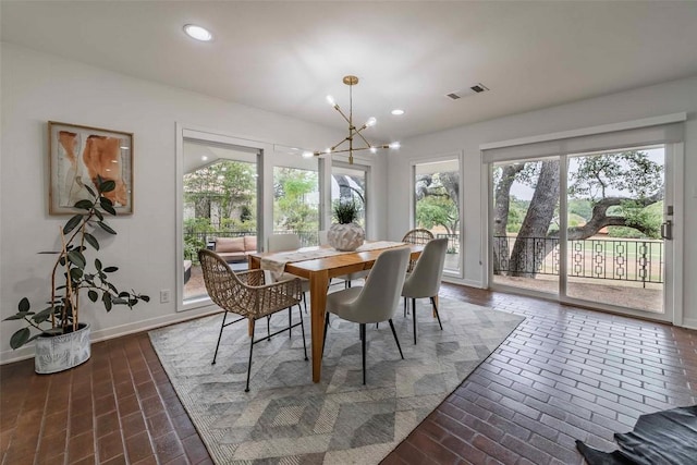 928 Porpoise St, Lakeway, TX 78734 - dining space with a chandelier, recessed lighting, and baseboards