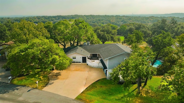 928 Porpoise St, Lakeway, TX 78734 - view from above of property featuring a heavily wooded area