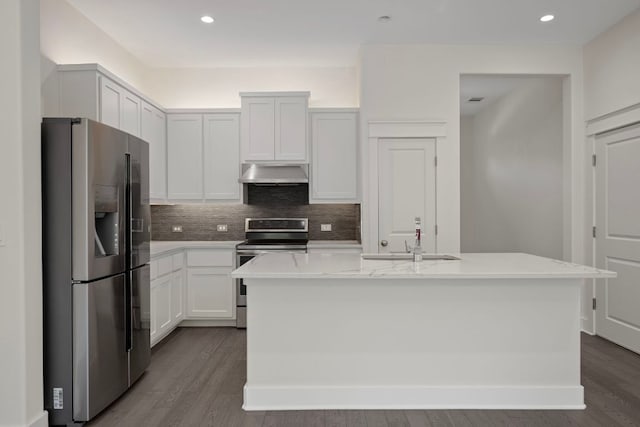 13501 Metric Blvd Unit 22, Austin, TX 78727 - kitchen with stainless steel appliances, extractor fan, a sink, decorative backsplash, and wood finished floors