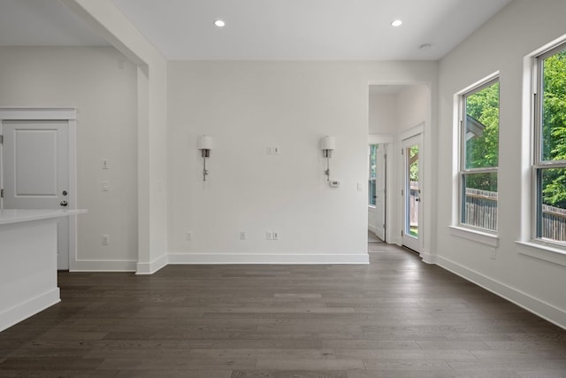 13501 Metric Blvd Unit 22, Austin, TX 78727 - unfurnished room featuring dark wood-type flooring, recessed lighting, and baseboards