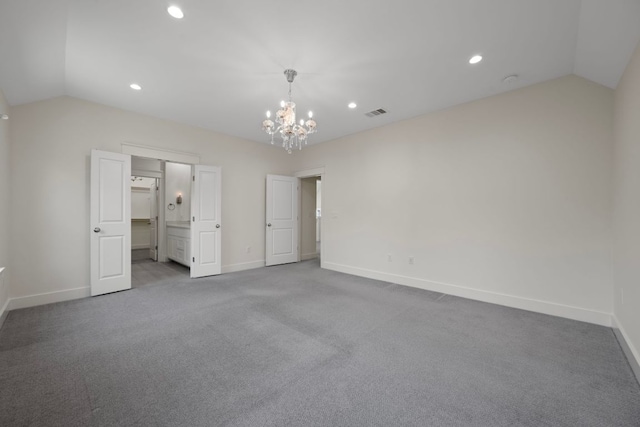 13501 Metric Blvd Unit 22, Austin, TX 78727 - unfurnished bedroom with vaulted ceiling, baseboards, a chandelier, recessed lighting, and carpet floors