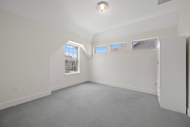 13501 Metric Blvd Unit 22, Austin, TX 78727 - additional living space featuring baseboards, carpet, and vaulted ceiling