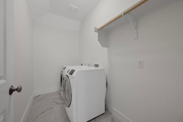 13501 Metric Blvd Unit 22, Austin, TX 78727 - laundry room featuring light marble finish flooring, separate washer and dryer, and baseboards