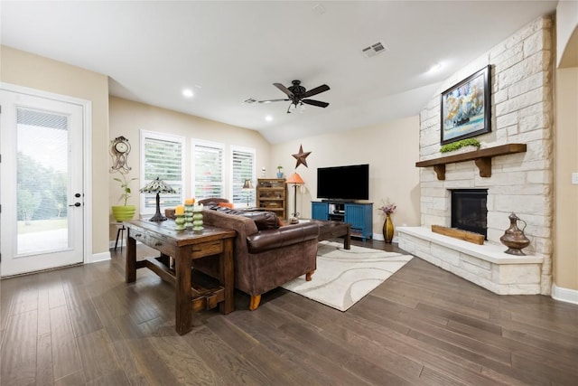 2628 Reunion Blvd, Austin, TX 78737 - living area with dark wood-type flooring, a ceiling fan, baseboards, a stone fireplace, and recessed lighting