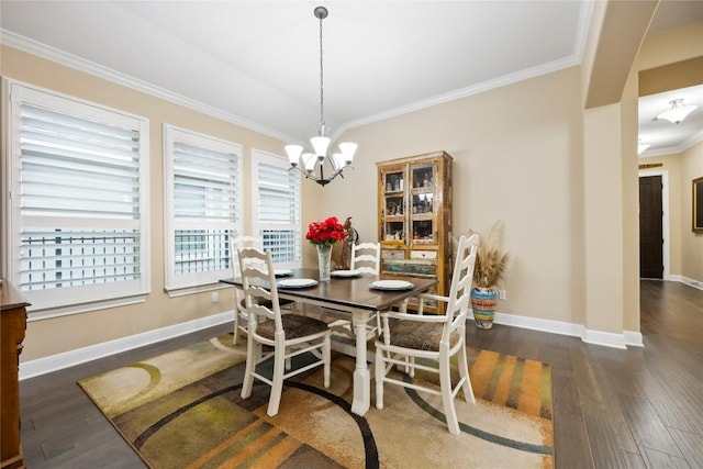 2628 Reunion Blvd, Austin, TX 78737 - dining area with a chandelier, wood finished floors, ornamental molding, and baseboards