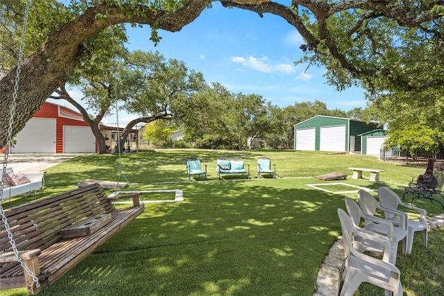 1020 Foothills Dr, Dripping Springs, TX 78620 - view of green lawn with an outdoor structure and a detached garage