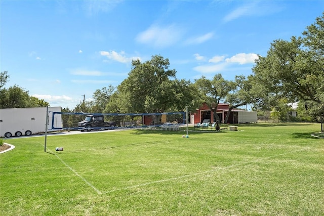 1020 Foothills Dr, Dripping Springs, TX 78620 - surrounding community featuring volleyball court and a yard