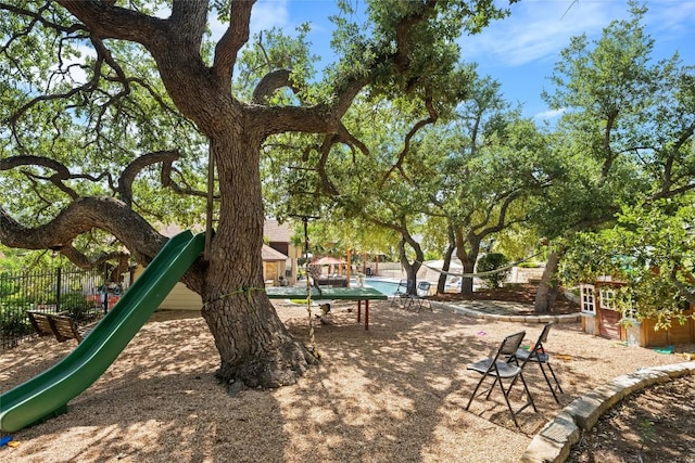 1020 Foothills Dr, Dripping Springs, TX 78620 - view of playground featuring an outdoor structure