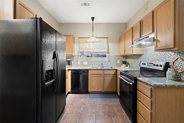 1301 S Quinlan Park Rd, Austin, TX 78732 - kitchen with black appliances, under cabinet range hood, backsplash, a sink, and light tile patterned floors