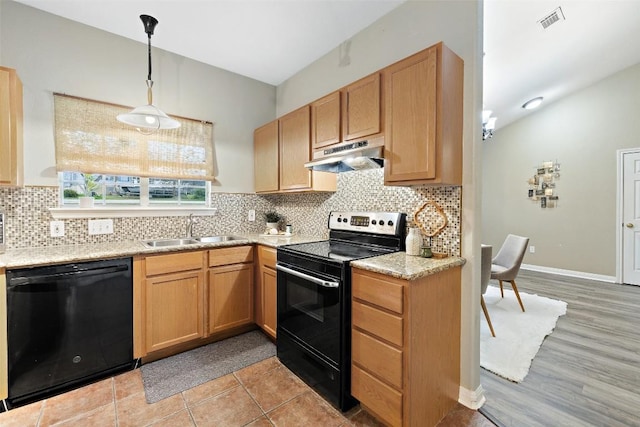 1301 S Quinlan Park Rd, Austin, TX 78732 - kitchen with black appliances, under cabinet range hood, a sink, backsplash, and lofted ceiling