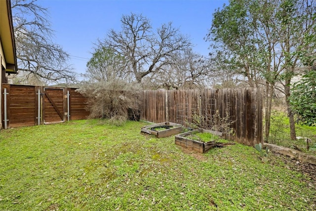 1301 S Quinlan Park Rd, Austin, TX 78732 - view of yard with a garden and a gate