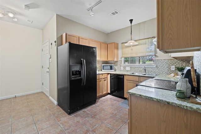 1301 S Quinlan Park Rd, Austin, TX 78732 - kitchen with black appliances, tasteful backsplash, light tile patterned floors, light brown cabinets, and hanging light fixtures
