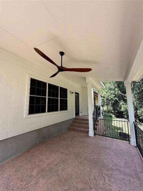 1301 S Quinlan Park Rd, Austin, TX 78732 - view of patio / terrace featuring a ceiling fan