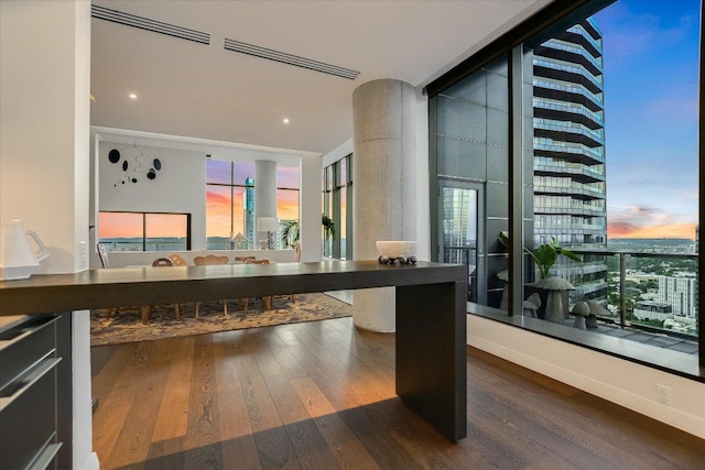 210 Lavaca St Unit 3603, Austin, TX 78701 - home office with wood finished floors and a wall of windows