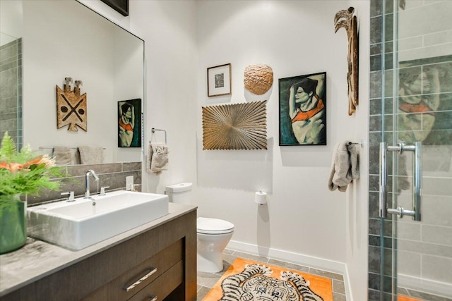 210 Lavaca St Unit 3603, Austin, TX 78701 - full bath featuring vanity, toilet, a tile shower, and tile patterned flooring