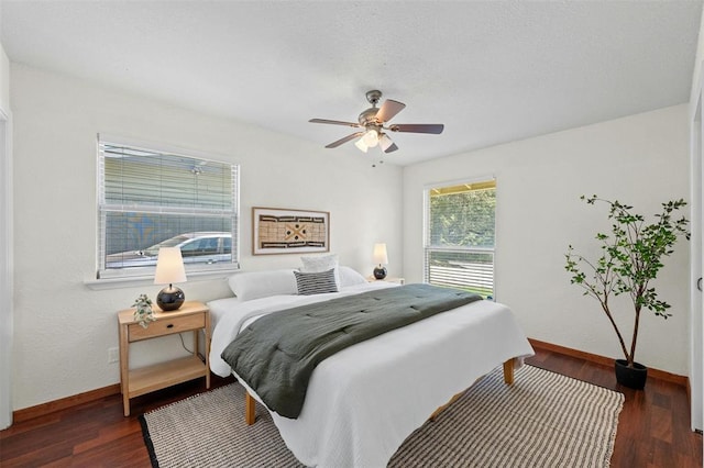 4610 S 1st St, Austin, TX 78745 - bedroom with wood finished floors and ceiling fan