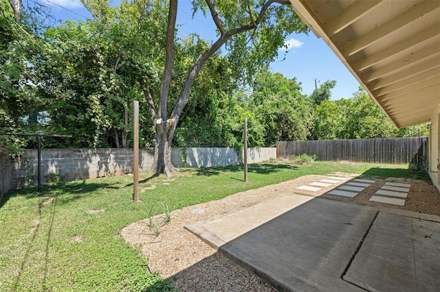 4610 S 1st St, Austin, TX 78745 - fenced backyard with a patio area