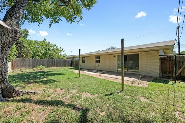 4610 S 1st St, Austin, TX 78745 - fenced backyard featuring a patio area
