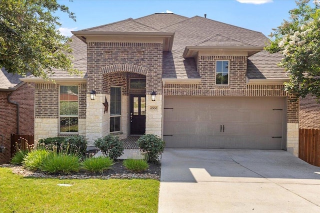 6500 Llano Stage Trl, Austin, TX 78738 - french country inspired facade featuring stone siding, concrete driveway, and brick siding