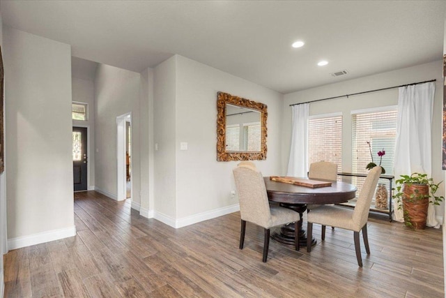 6500 Llano Stage Trl, Austin, TX 78738 - dining room featuring healthy amount of natural light, wood finished floors, and recessed lighting