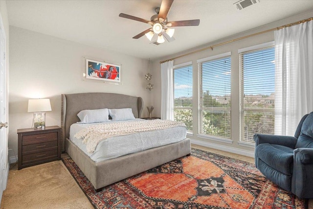 6500 Llano Stage Trl, Austin, TX 78738 - bedroom featuring light colored carpet, a ceiling fan, and baseboards