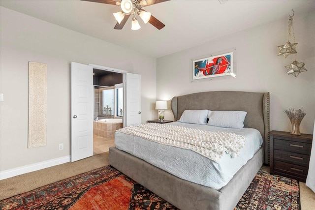 6500 Llano Stage Trl, Austin, TX 78738 - carpeted bedroom with baseboards, connected bathroom, and ceiling fan