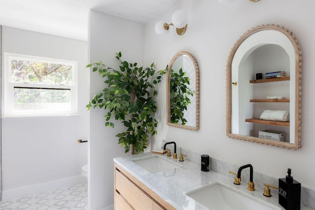 7302 Jester Blvd, Austin, TX 78750 - full bathroom with double vanity and toilet